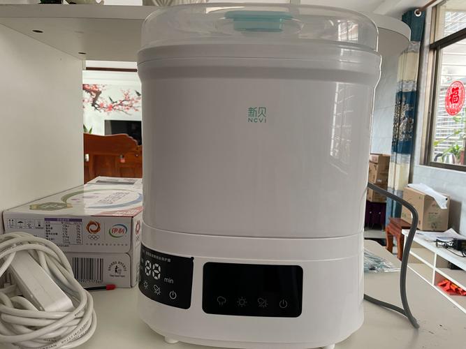 新貝嬰兒奶瓶消毒器帶烘干機二合一體機 寶寶專用煮奶瓶鍋柜家用，消毒暖奶一機搞定